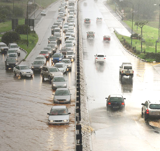 Cars in flooded road