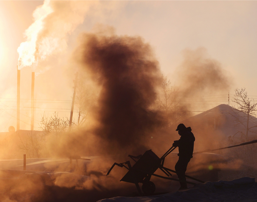 Man working in a coal plant